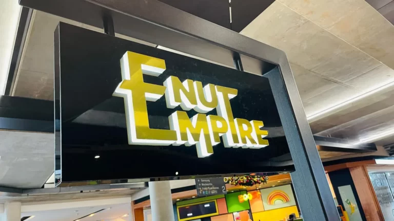 Nut Empire illuminated sign in a shopping centre