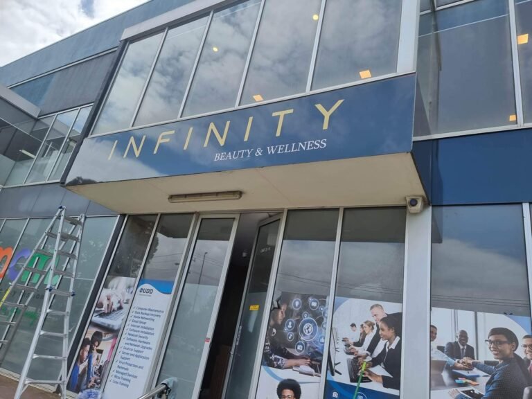 Infinity Beauty & Wellness fascia sign above a shopfront