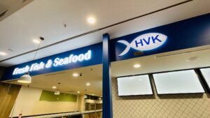 HVK Fresh Fish & Seafood fascia sign in a shopping centre