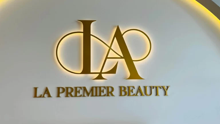 Backlit gold 3D LA Premier Beauty logo sign