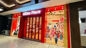 Office Place shopfront with red frame and full-colour window graphics