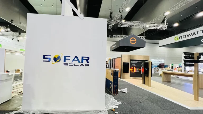 SOFAR Solar exhibition stand with branded white display wall